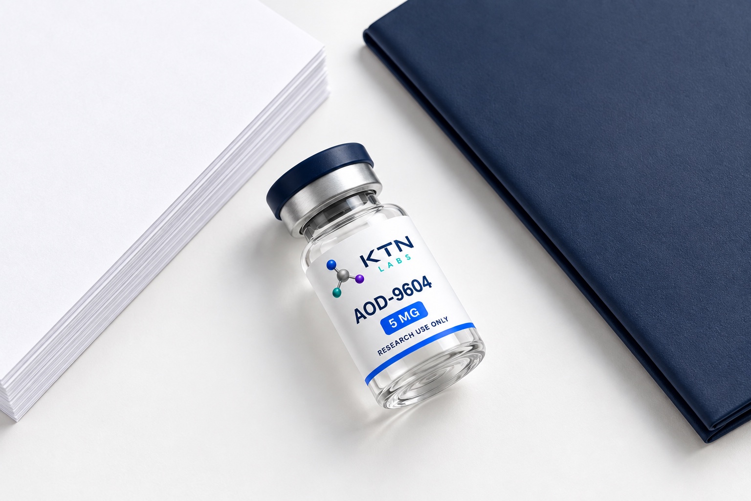 KTN research vial beside a document folder